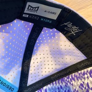 A-game hydro pastel Melin hat. Worn to try on. Perfect condition. Size small